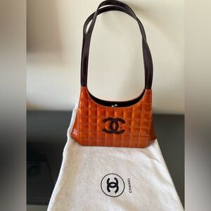 Chanel Glossy Orange Quilted Shoulder Bag with dusty